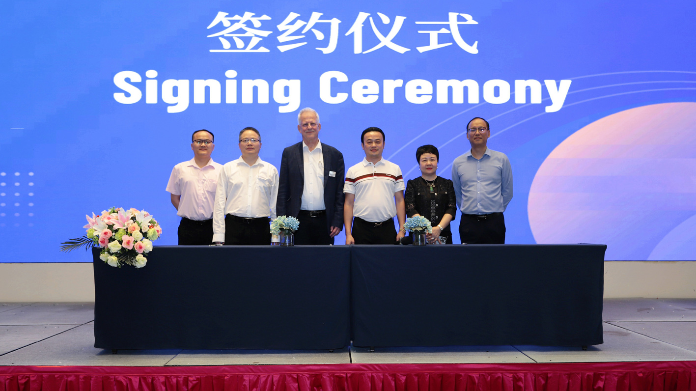 Pictured (left to right) are Sheng Du, Renguan Lian and Michael Hubensteiner of Rieter China, Yiyu Zhan and Chanhong Feng of Guangxi Baisheng and Michael Wang of Rieter China. © Rieter